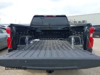 2025 Chevrolet Silverado 1500 LT with VIN 1GCPACED8SZ128090, listed as a IAAI auction lot 42158661 with 5,869 mi miles and . Bid and sale history available at DreamBid. Image 18.