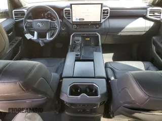 2023 Toyota Tundra Platinum with VIN 5TFNA5DBXPX073809, listed as a Copart auction lot 51221005 with 60,726 mi miles and Salvage title. Bid and sale history available at DreamBid. Image 8.