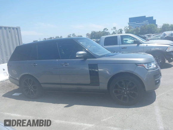 2014 Land Rover Range Rover HSE z VIN SALGS2WF8EA180130, wystawiony jako IAAI lot #42516263 z przebiegiem 114 666 mil mil oraz . Historia ofert i sprzedaży dostępna na DreamBid. Obrazek 13.