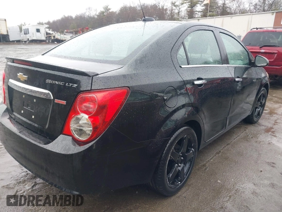 2016 Chevrolet Sonic LTZ z VIN 1G1JE5SB8G4143596, wystawiony jako IAAI lot #41874653 z przebiegiem 148 855 mil mil oraz . Historia ofert i sprzedaży dostępna na DreamBid. Obrazek 4.