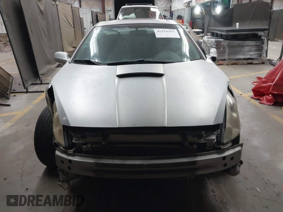 2004 Toyota Celica GT z VIN JTDDR32TX40167973, wystawiony jako IAAI lot #41458284 z przebiegiem 203 384 mil mil oraz . Historia ofert i sprzedaży dostępna na DreamBid. Obrazek 11.
