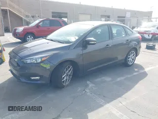 2015 Ford Focus SE with VIN 1FADP3F25FL348929, listed as a IAAI auction lot 42275725 with 99,668 mi miles and . Bid and sale history available at DreamBid. Image 2.