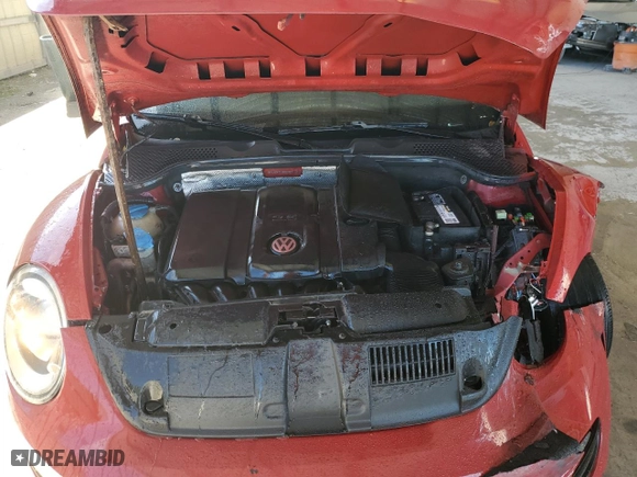 2012 Volkswagen Beetle 2.5L with VIN 3VWJX7AT7CM662822, listed as a Copart auction lot 74215804 with 115,890 mi miles and Salvage Title. Bid and sale history available at carsss.com. Image 11.