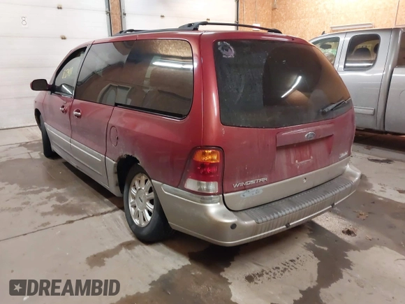2003 Ford Windstar LTD with VIN 2FMDA58433BB41744, listed as a IAAI auction lot 41385411 with 186,368 mi miles and . Bid and sale history available at carsss.com. Image 3.
