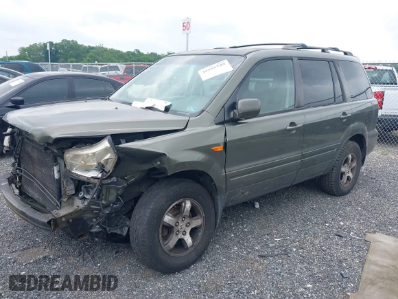 2006 Honda Pilot EX-L with VIN 5FNYF18776B011211, listed as a IAAI auction lot 39555749 with 295,998 mi miles and . Bid and sale history available at DreamBid. Image 2.