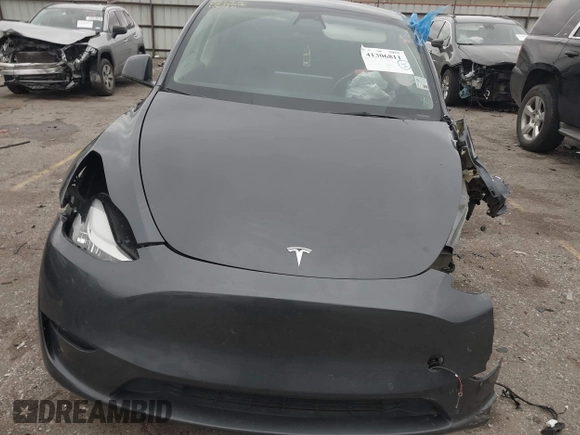 2023 Tesla Model Y Long Range with VIN 7SAYGAEE8PF587202, listed as a IAAI auction lot 41306811 with 1 mi miles. Bid and sale history available at carsss.com. Image 11.
