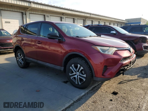 2018 Toyota RAV4 LE with VIN 2T3BFREV7JW723938, listed as a Copart auction lot 62814195 with 107,051 mi miles and Salvage title. Bid and sale history available at DreamBid. Image 4.