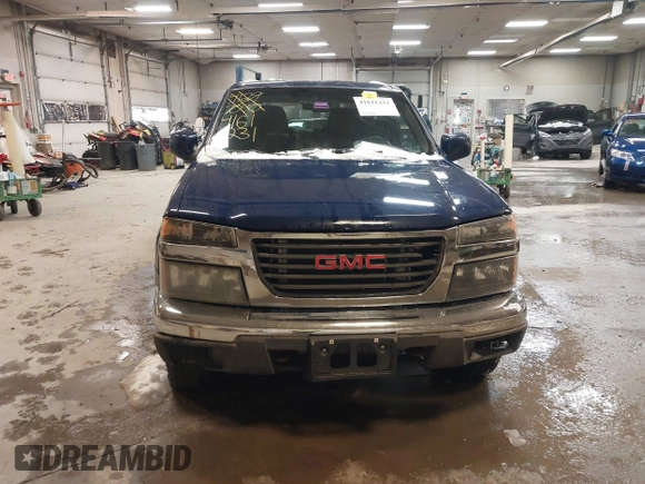 2011 GMC Canyon SLE1 with VIN 1GTH6MFE3B8123808, listed as a IAAI auction lot 41611231 with 142,877 mi miles. Bid and sale history available at carsss.com. Image 12.