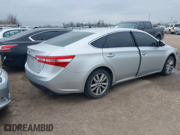 2013 Toyota Avalon XLE with VIN 4T1BK1EB4DU053880, listed as a IAAI auction lot 41605330 with 266,336 mi miles and . Bid and sale history available at DreamBid. Image 4.