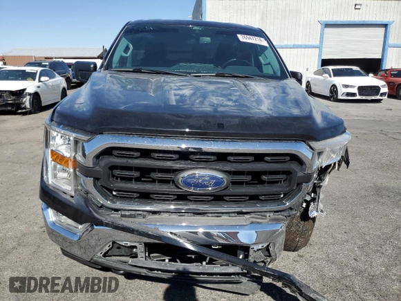 2021 Ford F-150 XL with VIN 1FTMF1E50MKD44349, listed as a Copart auction lot 76947214 with 34,592 mi miles and Salvage title. Bid and sale history available at DreamBid. Image 5.
