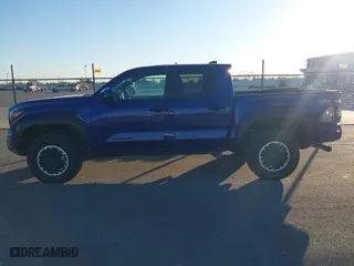 2024 Toyota Tacoma 4WD SR5 with VIN 3TYLB5JN3RT028338, listed as a IAAI auction lot 41870958 with 2,249 mi miles. Bid and sale history available at carsss.com. Image 14.