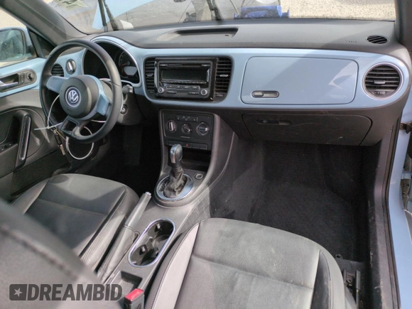 2013 Volkswagen Beetle 2.5L with VIN 3VW5X7AT4DM829494, listed as a Copart auction lot 47654065 with 34,987 mi miles and Salvage title. Bid and sale history available at DreamBid. Image 8.