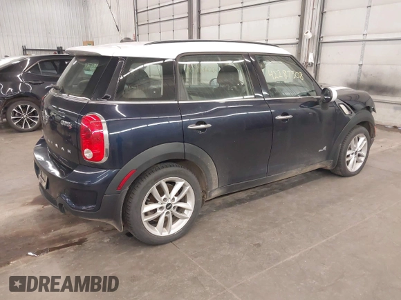 2014 MINI Countryman S with VIN WMWZC5C56EWP38017, listed as a IAAI auction lot 42287308 with 151,780 mi miles and . Bid and sale history available at DreamBid. Image 4.