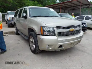 2013 Chevrolet Suburban LT with VIN 1GNSKJE74DR166223, listed as a IAAI auction lot 42172184 with 200,901 mi miles and . Bid and sale history available at DreamBid. Image 1.