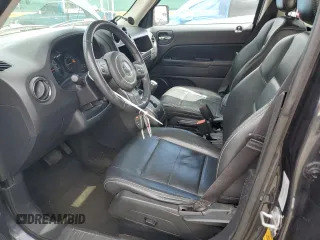 2015 Jeep Patriot High Altitude with VIN 1C4NJRFB9FD258471, listed as a Copart auction lot 54759735 with 127,823 mi miles and Salvage title. Bid and sale history available at DreamBid. Image 7.
