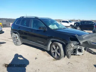 2020 Jeep Cherokee Limited with VIN 1C4PJLDB8LD577123, listed as a IAAI auction lot 41220273 with 92,573 mi miles. Bid and sale history available at carsss.com. Image 1.