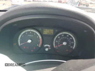 2009 Kia Rio LX with VIN KNADE243296500963, listed as a Copart auction lot 51061595 with 76,596 mi miles and Salvage Title. Bid and sale history available at carsss.com. Image 9.