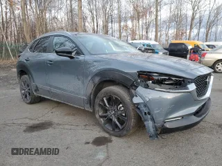 2023 Mazda CX-30 S Carbon Edition с VIN 3MVDMBCM3PM500403, выставлен на аукционе Copart как лот 88146095 с пробегом 29 861 миль миль и Списание • Salvage title. История ставок и продаж доступна на DreamBid. Изображение 4.