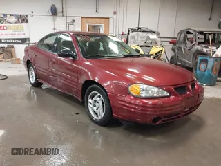 2002 Pontiac Grand Am SE z VIN 1G2NE52F92C291335, wystawiony jako IAAI lot #41665150 z przebiegiem 75 552 mil mil oraz . Historia ofert i sprzedaży dostępna na DreamBid. Obrazek 1.