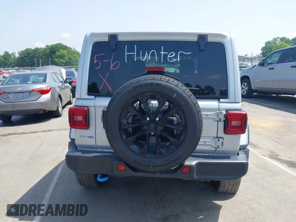 2024 Jeep Wrangler Sahara with VIN 1C4RJXP60RW292136, listed as a IAAI auction lot 42280063 with 26,701 mi miles and . Bid and sale history available at DreamBid. Image 16.