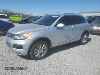 2011 Volkswagen Touareg Sport with VIN WVGFF9BP5BD002616, listed as a Copart auction lot 50200565 with 204,458 mi miles and Clean Title. Bid and sale history available at DreamBid. Image 1.