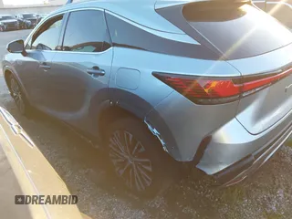 2024 Lexus RX 350h z VIN 2T2BBMCAXRC036064, wystawiony jako IAAI lot #41344207 z przebiegiem 9389 mil mil oraz . Historia ofert i sprzedaży dostępna na DreamBid. Obrazek 3.