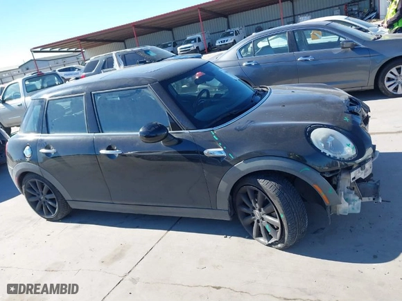 2015 MINI Cooper Hardtop 4 Door S with VIN WMWXU3C53F2B56459, listed as a IAAI auction lot 41400624 with NaN miles. Bid and sale history available at carsss.com. Image 13.