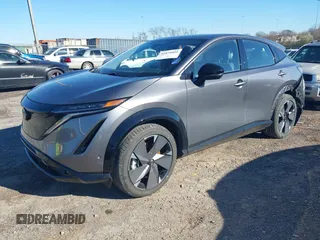 2024 Nissan ARIYA Platinum+ z VIN JN1DF0CD2RM740057, wystawiony jako IAAI lot #41824664 z przebiegiem 1167 mil mil oraz . Historia ofert i sprzedaży dostępna na DreamBid. Obrazek 2.