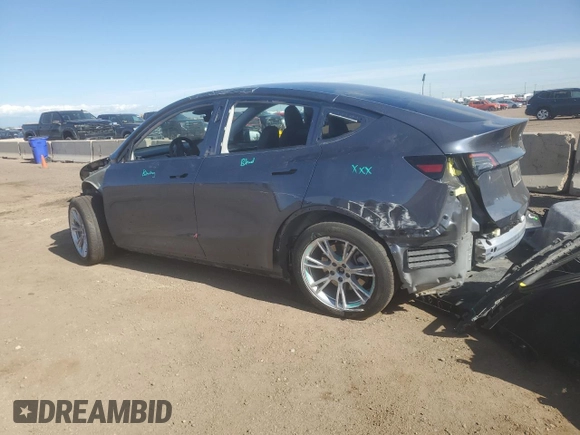 2023 Tesla Model Y Long Range z VIN 7SAYGDEE7PF965446, wystawiony jako Copart lot #54710375 z przebiegiem 23 807 mil mil oraz Szkoda całkowita • Salvage title. Historia ofert i sprzedaży dostępna na DreamBid. Obrazek 2.