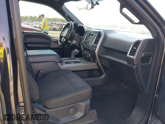 2015 Ford F-150 XLT with VIN 1FTEW1EG3FKE16010, listed as a IAAI auction lot 42107938 with 242,625 mi miles and . Bid and sale history available at DreamBid. Image 5.