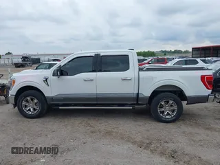 2021 Ford F-150 XL z VIN 1FTFW1ED7MFB36946, wystawiony jako IAAI lot #42318029 z przebiegiem 16 960 mil mil oraz . Historia ofert i sprzedaży dostępna na DreamBid. Obrazek 14.