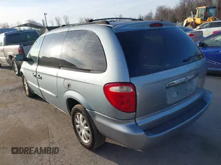 2003 Chrysler Town & Country LX with VIN 2C4GP44L73R238380, listed as a IAAI auction lot 41705420 with 129,225 mi miles and . Bid and sale history available at DreamBid. Image 14.