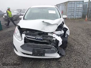 2013 Ford C-Max Hybrid SE with VIN 1FADP5AU3DL529867, listed as a IAAI auction lot 41725293 with 95,071 mi miles. Bid and sale history available at carsss.com. Image 12.