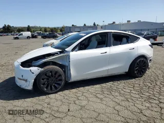 2021 Tesla Model Y Performance z VIN 5YJYGDEF2MF277467, wystawiony jako Copart lot #52410275 z przebiegiem 57 116 mil mil oraz Szkoda całkowita • Salvage title. Historia ofert i sprzedaży dostępna na DreamBid. Obrazek 1.