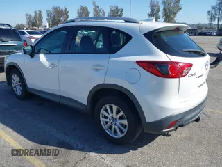 2016 Mazda CX-5 Sport with VIN JM3KE2BY9G0879654, listed as a IAAI auction lot 41819154 with 65,586 mi miles. Bid and sale history available at carsss.com. Image 3.