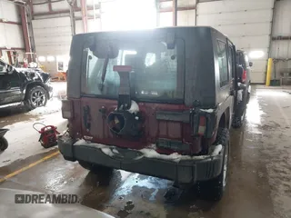 2009 Jeep Wrangler Unlimited X with VIN 1J4GZ39159L718649, listed as a IAAI auction lot 41395033 with 289,574 mi miles. Bid and sale history available at carsss.com. Image 16.