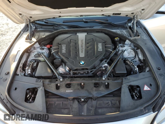 2015 BMW 7 Series 750i with VIN WBAYA8C53FGK19778, listed as a Copart auction lot 77258684 with 34,535 mi miles and Salvage title. Bid and sale history available at DreamBid. Image 11.