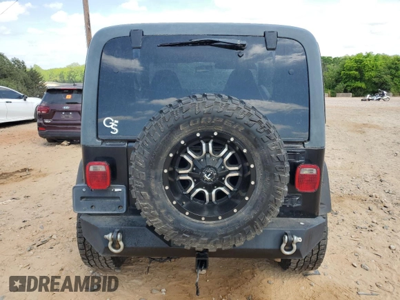 1999 Jeep Wrangler Sport with VIN 1J4FY19S9XP423684, listed as a Copart auction lot 55079455 with 149,756 mi miles and Salvage Title. Bid and sale history available at carsss.com. Image 6.