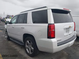2018 Chevrolet Tahoe LT with VIN 1GNSKBKC7JR351112, listed as a IAAI auction lot 41732631 with 103,771 mi miles. Bid and sale history available at carsss.com. Image 3.