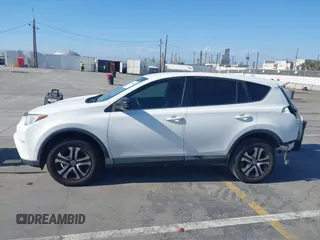 2017 Toyota RAV4 LE with VIN JTMZFREV8HJ145159, listed as a IAAI auction lot 42078884 with 103,425 mi miles and . Bid and sale history available at carsss.com. Image 15.