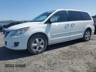 2014 Volkswagen Routan z VIN 2C4RVADG8ER135455, wystawiony jako Copart lot #51336385 z przebiegiem 86 341 mil mil oraz Tytuł czysty. Historia ofert i sprzedaży dostępna na DreamBid. Obrazek 1.