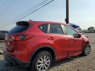 2014 Mazda CX-5 Touring with VIN JM3KE2CY0E0309845, listed as a Copart auction lot 62193734 with 97,878 mi miles and Salvage Title. Bid and sale history available at carsss.com. Image 3.