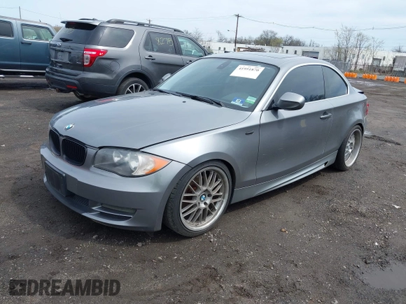 2011 BMW 1 Series 128i with VIN WBAUP9C52BVL89591, listed as a IAAI auction lot 41951870 with 131,377 mi miles and . Bid and sale history available at DreamBid. Image 17.