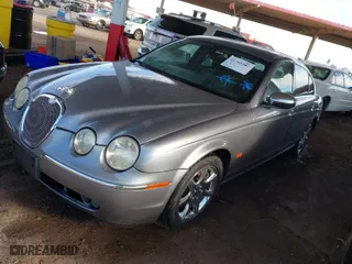 2007 Jaguar S-Type 3.0 with VIN SAJWA01A47FN75550, listed as a IAAI auction lot 41765587 with 153,072 mi miles. Bid and sale history available at carsss.com. Image 2.