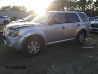 2010 Mercury Mariner with VIN 4M2CN9BG5AKJ16629, listed as a Copart auction lot 85464894 with 101,587 mi miles and Salvage Title. Bid and sale history available at DreamBid. Image 1.