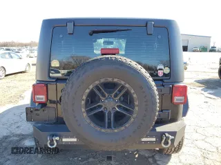 2016 Jeep Wrangler Black Bear with VIN 1C4AJWAG9GL230693, listed as a Copart auction lot 43350885 with 75,761 mi miles and Salvage title. Bid and sale history available at DreamBid. Image 6.