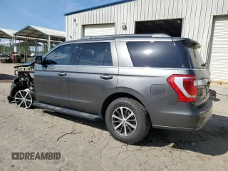2018 Ford Expedition XLT with VIN 1FMJU1HT1JEA26958, listed as a Copart auction lot 52913995 with 77,790 mi miles and Salvage title. Bid and sale history available at DreamBid. Image 2.