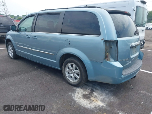 2008 Chrysler Town & Country Touring with VIN 2A8HR54P28R803822, listed as a IAAI auction lot 42459330 with 169,661 mi miles and . Bid and sale history available at DreamBid. Image 3.