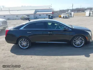 2014 Cadillac XTS Platinum with VIN 2G61W5S84E9127014, listed as a IAAI auction lot 41776334 with 99,879 mi miles. Bid and sale history available at carsss.com. Image 14.