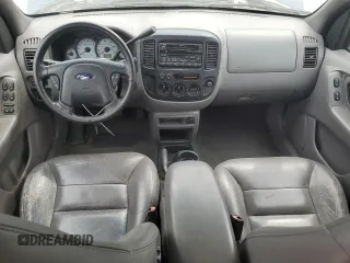 2001 Ford Escape XLT with VIN 1FMYU03131KF10968, listed as a Copart auction lot 67849474 with 197,328 mi miles and Salvage Title. Bid and sale history available at carsss.com. Image 8.